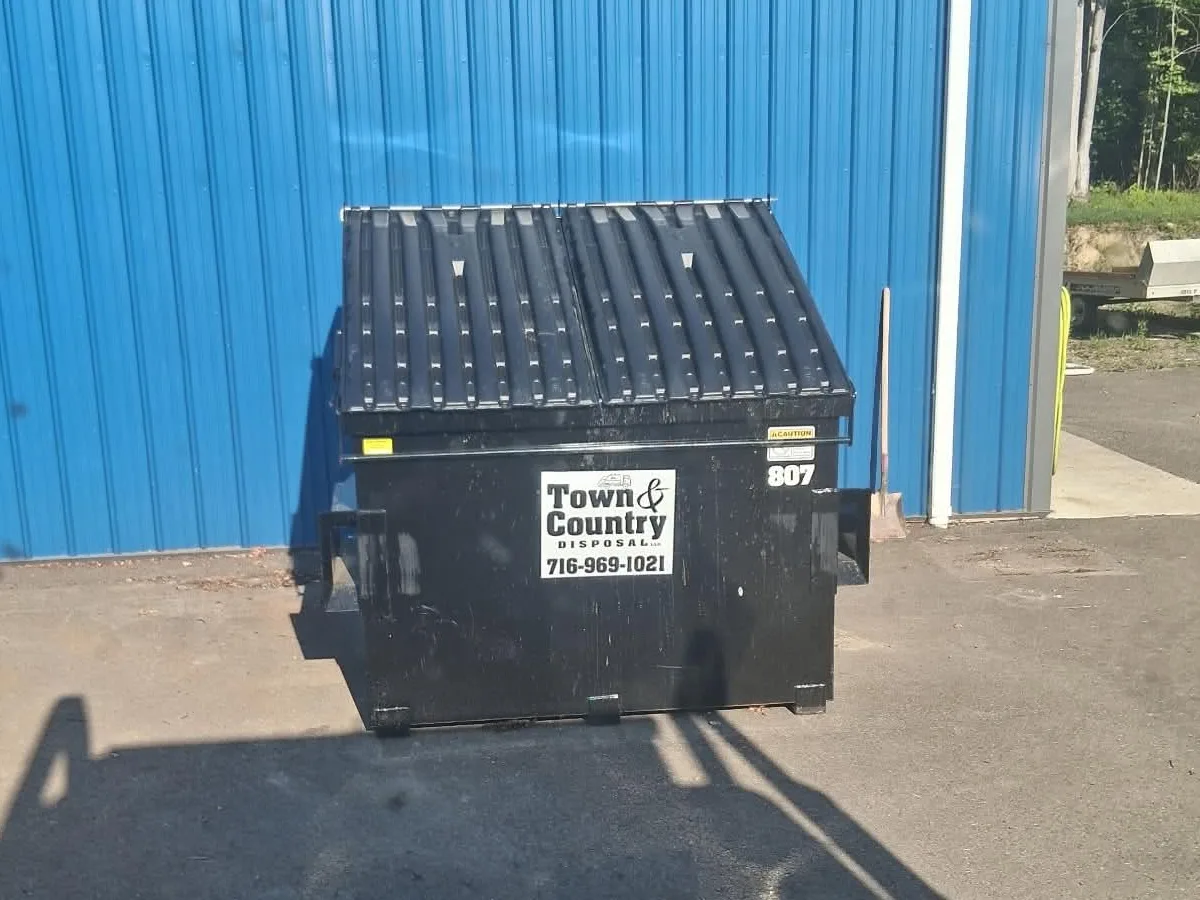 8 yard Town & Country Disposal commercial front-load dumpster at a Western New York facility